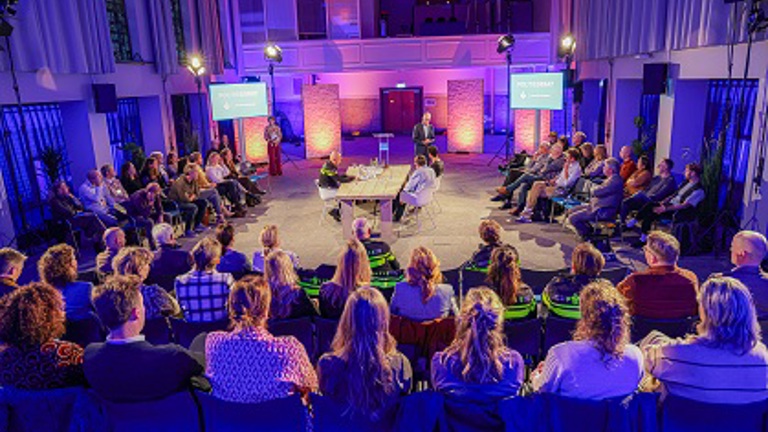 In debate in a room at the Netherlands Police Academy