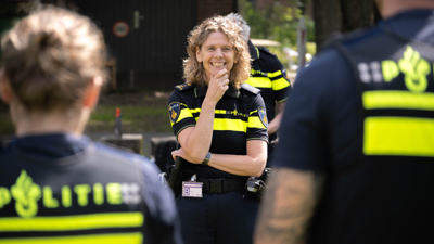 Commissioner Janny Knol smiles at students of the Netherlands Police Academy